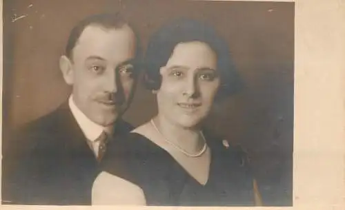Social history anonymous persons portrait souvenir elegant couple pearls