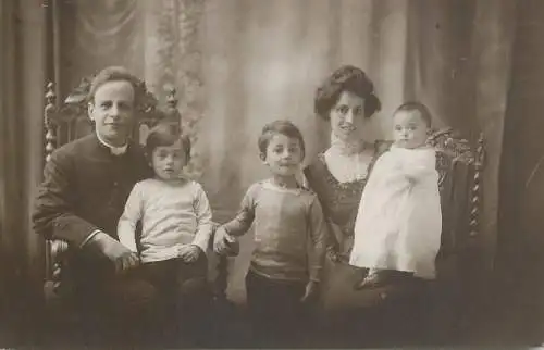 Social history anonymous persons portrait souvenir priest and family portrait