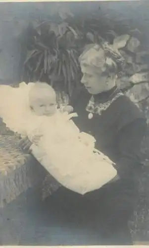 Social history anonymous persons portrait souvenir mother and baby