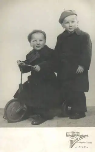 Social history anonymous persons portrait souvenir Feny Szov Mosoly album brothers tricycle