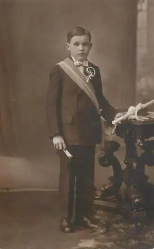 Social history anonymous persons portrait souvenir photo elegant boy religion