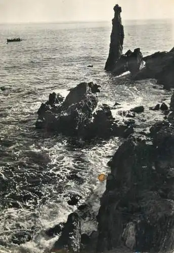 Italy seaside rocks place to identify