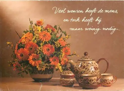 Chrysanthemum floral arrangement and porcelain tea service