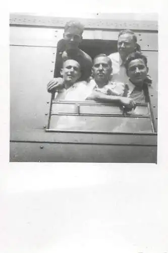 Anonymous persons group of men train