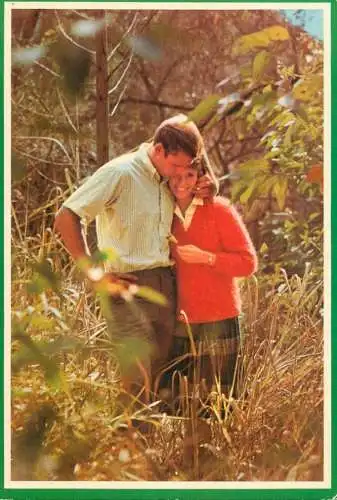 Romantic lovers couple walk in the park outdoor scenery