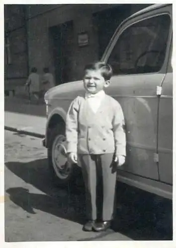 Anonymous persons instant photo boy near car posing