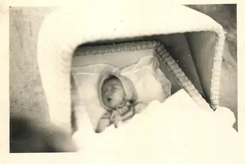 Anonymous persons baby instant photo