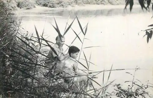 Anonymous persons fishing anglers photo