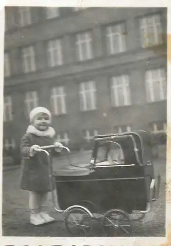 Anonymous persons girl with babycart