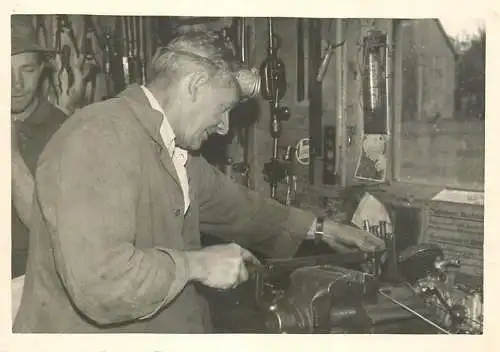Anonymous man working vise photo