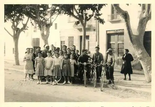 Anonymous persons bicycles place to identify photo