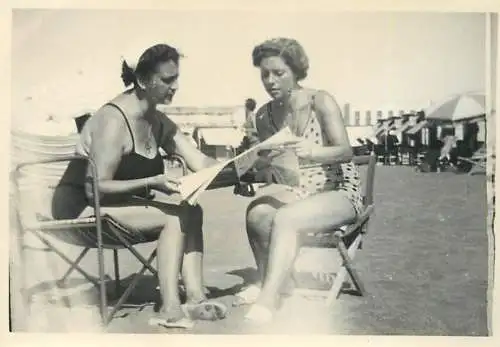 Anonymous persons women beach souvenir photo