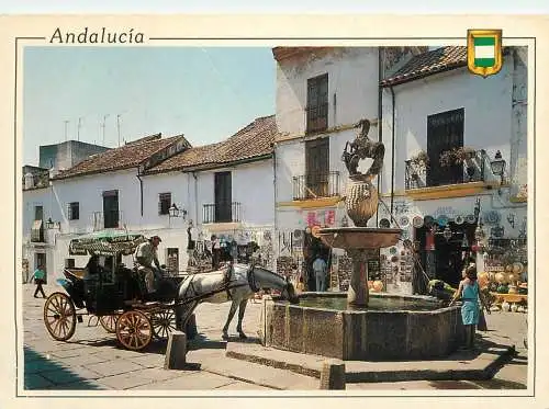 Spain Andalucia typical carriage with horse drinking water from city well