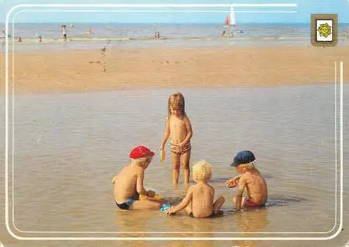 Belgium beach scene children play