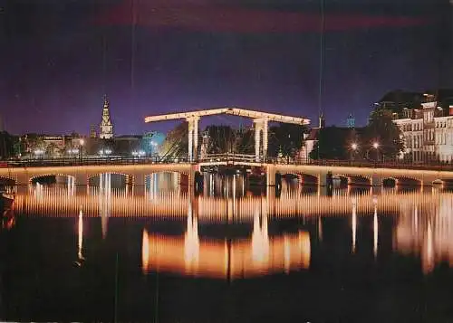 Amsterdam by night skinny bridge over Amstel