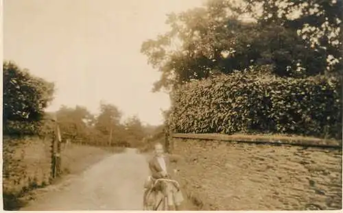 Real photo postcard place to identify elegant man bicycle