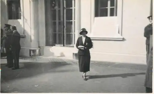 Real photo postcard place to identify elegant lady