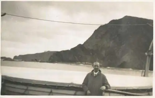 Real photo postcard place to identify man ship cruise