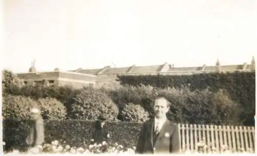 Real photo postcard place to identify elegant man