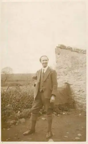 Real photo postcard place to identify elegant man