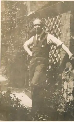 Real photo postcard place to identify elegant man