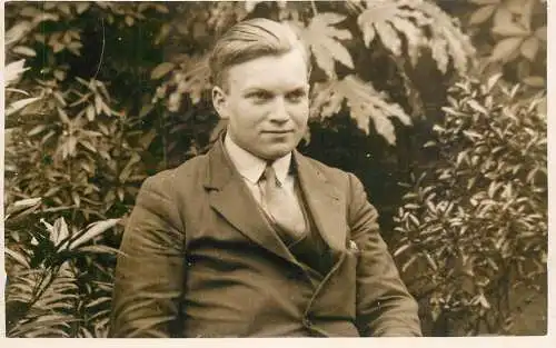 Real photo postcard place to identify elegant man