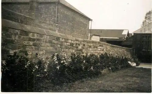 Real photo postcard place to identify house wall