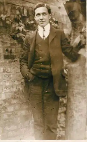 Real photo postcard place to identify elegant man