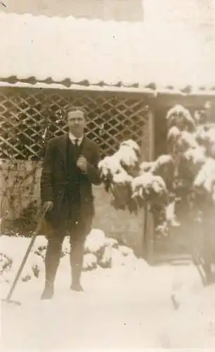 Real photo postcard place to identify elegant man winter
