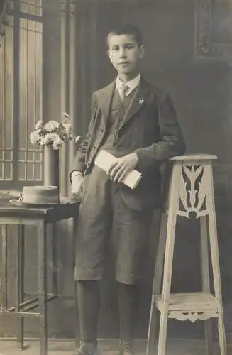 Souvenir photo postcard elegant boy flower vase hat 1916