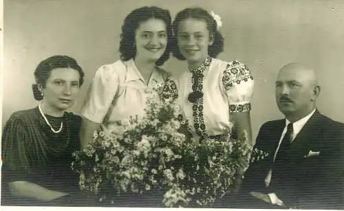 Social history souvenir photo postcard family traditional costume flower vase
