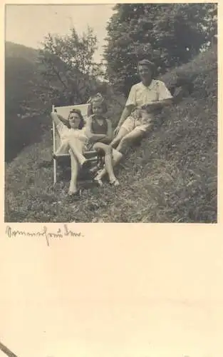 Social history souvenir photo postcard family in nature lawnchair sunbathing
