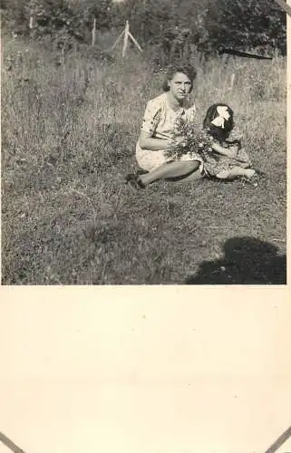 Social history souvenir photo postcard woman and daughter in nature field flowers