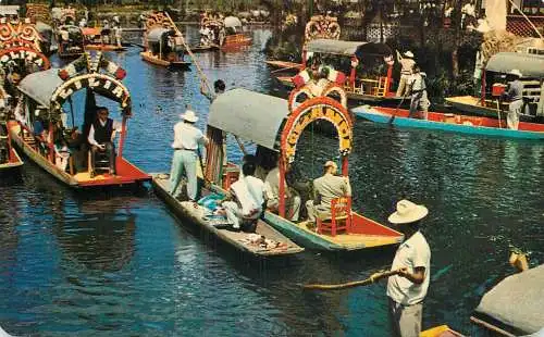 Mexico Xochimilco flower-decked boats with tourists
