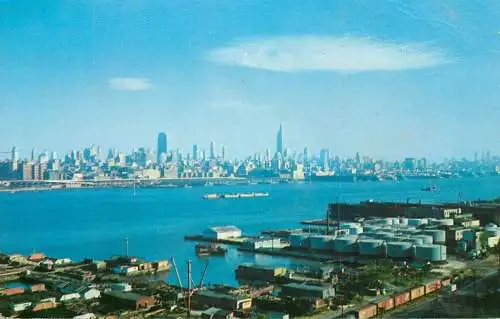 USA New York skyline rising above Hudson view from New Jersey docks