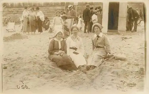 Social history souvenir photo group family on the beach