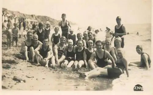 Social history souvenir photo group family on the beach