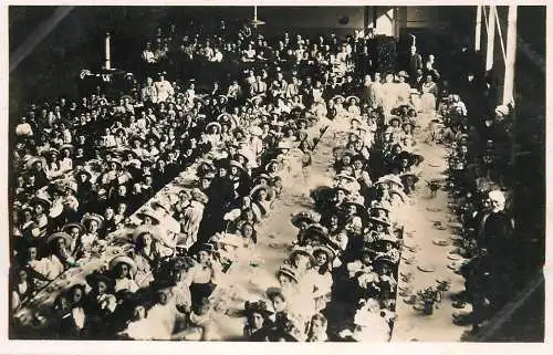 Social history souvenir photo elegant children at dinner table large hall
