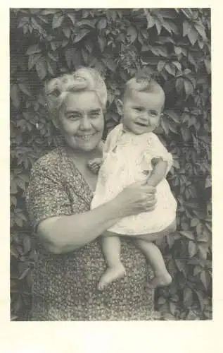 Children and family groups portraits and scenes souvenir photo 1943 Bunesti Romania grandma and baby