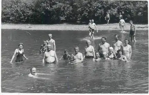 Anonymous persons social history souvenir photo postcard family bathing in river