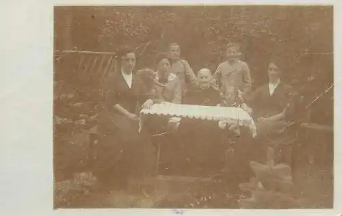 Anonymous persons social history souvenir photo postcard family portrait yard