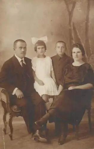 Anonymous persons social history souvenir photo postcard elegant family girl dress bow tie