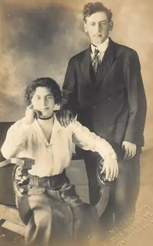 Photograph social history elegance family portrait couple haircut White Studio