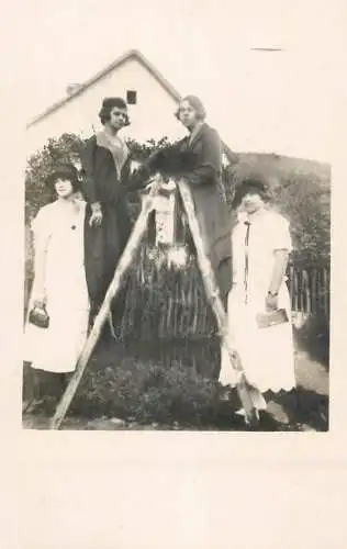 Photograph social history elegant women on ladder in yard