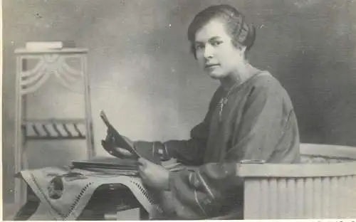 Photograph social history woman elegance locket reading 1922