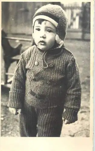 Photograph social history boy full suit toy horse