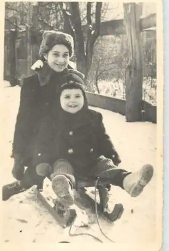 Photograph social history baby bebe beauty smile winter sled
