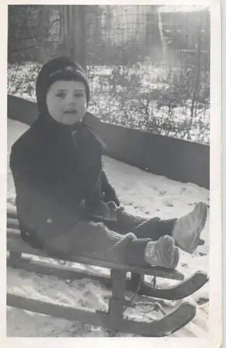 Photograph social history baby bebe beauty smile winter sled 1939