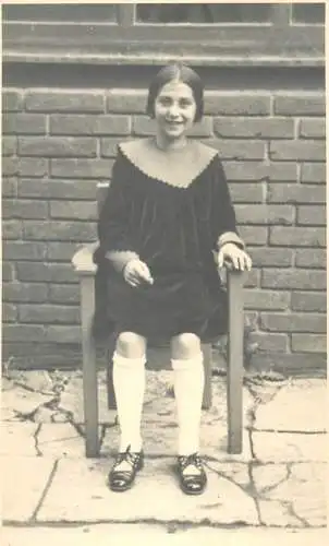 Photograph social history girl elegance chair 1938