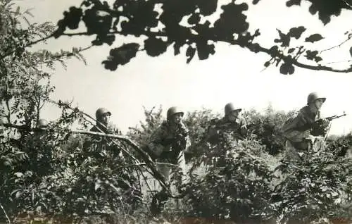 Soldiers during a military mission photo